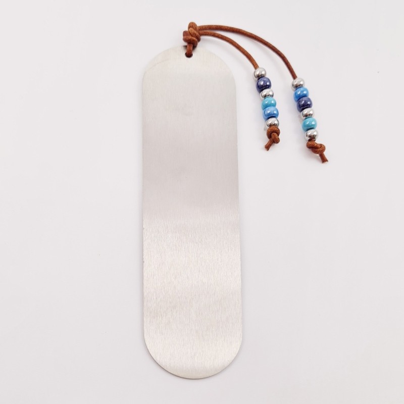 Marca páginas COLORES, cuero nacional trenzado, acero inoxidable y cristal checo.