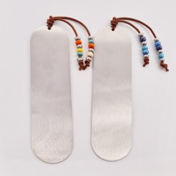 Marca páginas COLORES, cuero nacional trenzado, acero inoxidable y cristal checo.