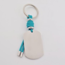 Llavero VENTURA, con toque de color, cuero y cordón, con un vidrio de color, acero inoxidable.