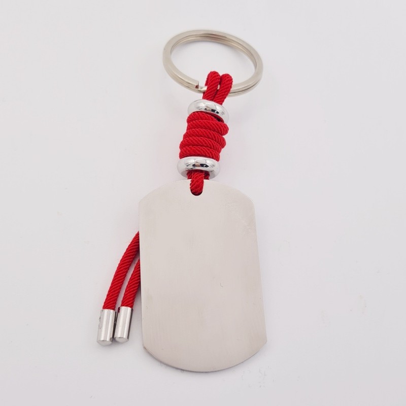 Llavero VENTURA, con toque de color, cuero y cordón, con un vidrio de color, acero inoxidable.