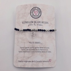 Pulsera DE LOS DESEOS, montada en acero inoxidable y dos perlas naturales.