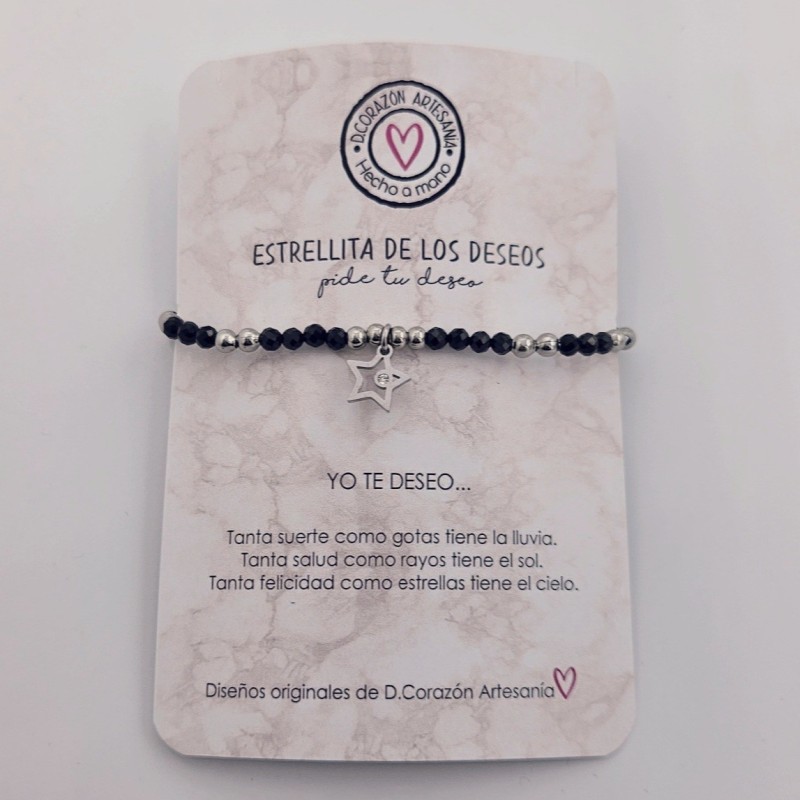 Pulsera DE LOS DESEOS, montada en acero inoxidable y dos perlas naturales.
