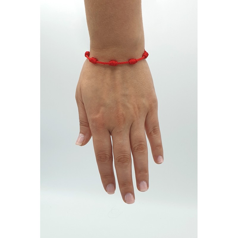 Pulsera modelo 7 nudos, con finales de acero, cordón de rayón.