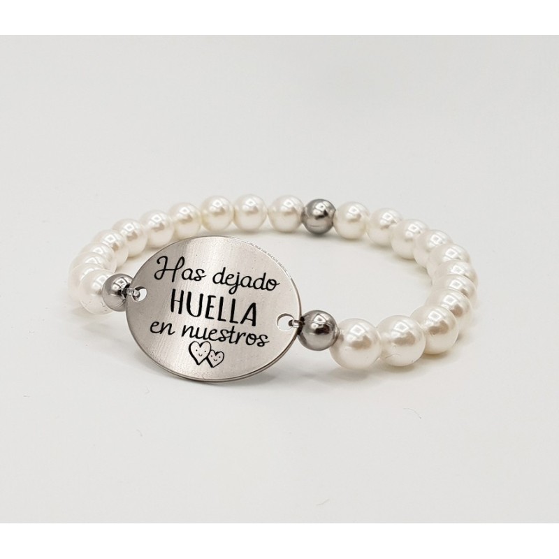 Pulsera ORIGEN, con frase (Has dejado huella en nuestros corazones) elástica.
